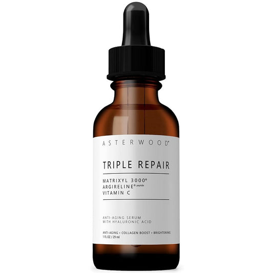 Amber facial serum bottle with black dropper cap, Triple Repair label