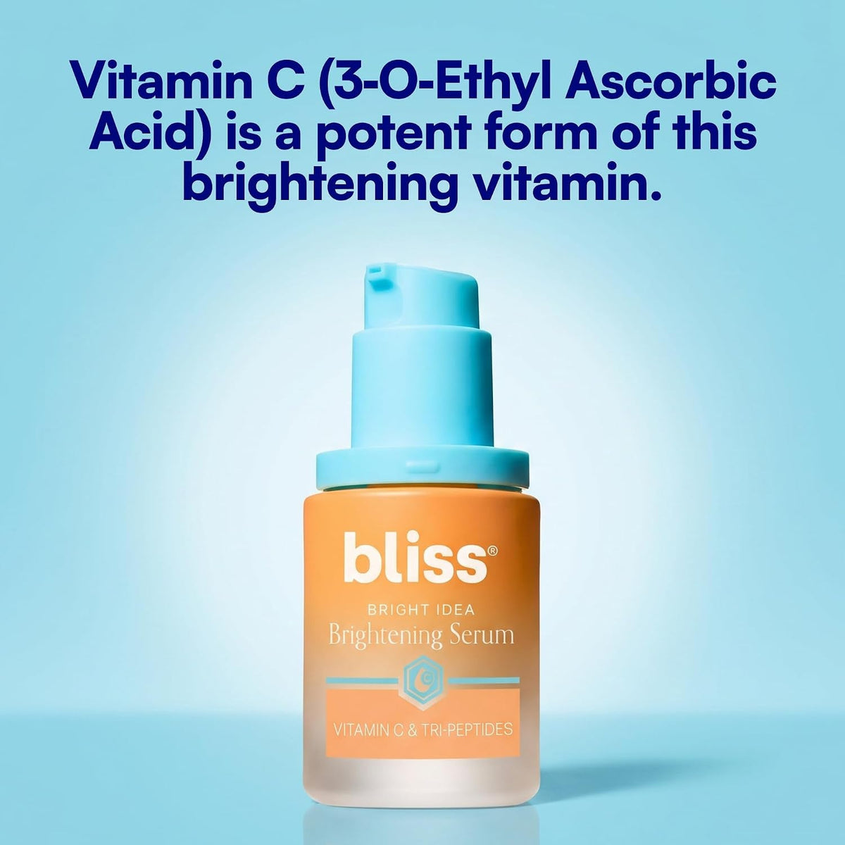 Brightening serum bottle with blue pump, orange label for vitamin C