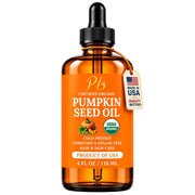 Pumpkin seed oil bottle with black cap, USDA Organic seal and Made in USA badge.