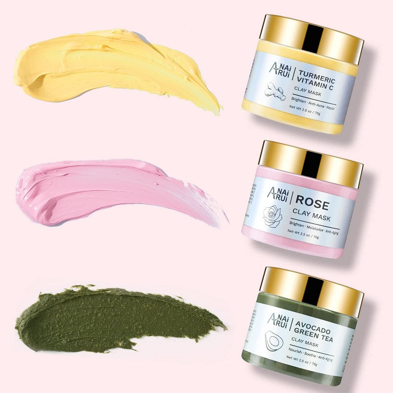 Three clay mask jars with turmeric, rose, and avocado green tea color swatches