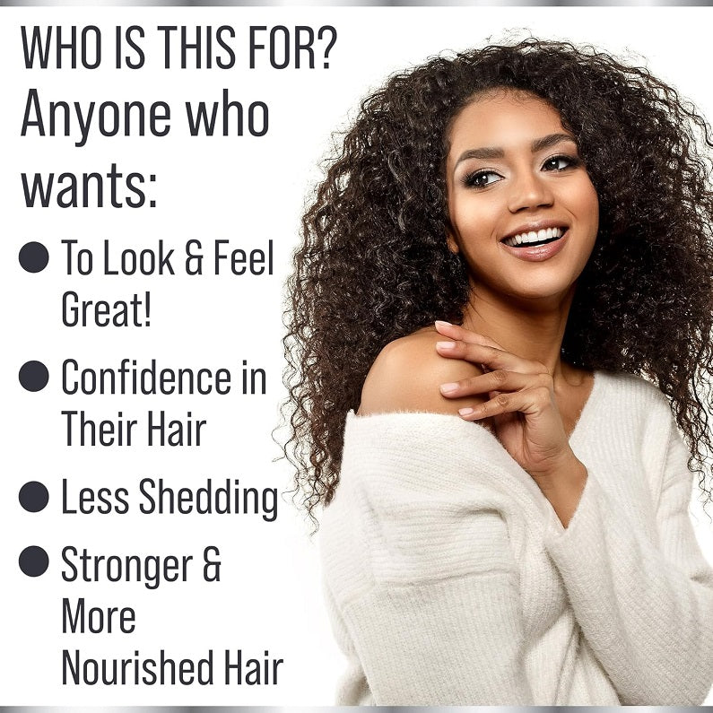 Smiling woman with curly hair in a light sweater, hair growth vitamins