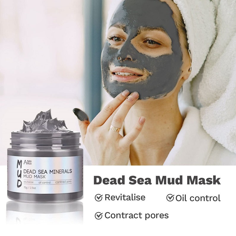 Dead Sea minerals mud mask jar with woman wearing gray mask and cosmetic brush