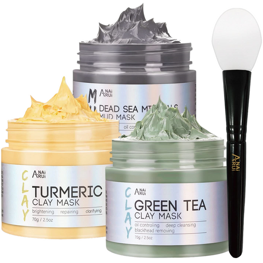 Three clay facial mask jars and applicator brush: turmeric, green tea, dead sea