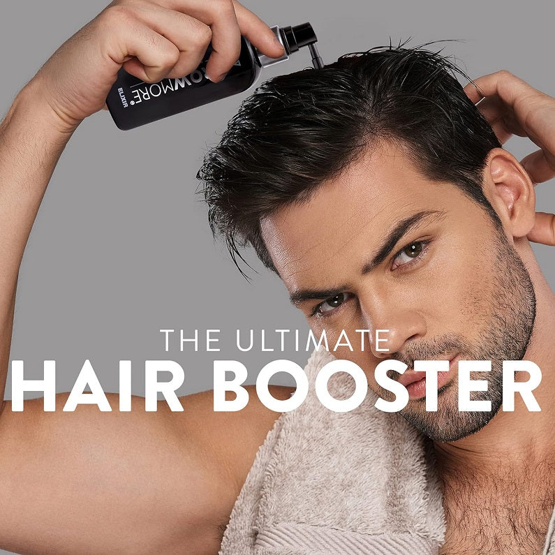 Watermans Grow More scalp elixir pump bottle held near dark hair and scalp