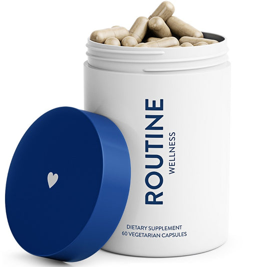 Routine Wellness hair growth supplement jar with blue lid and vegetarian capsules