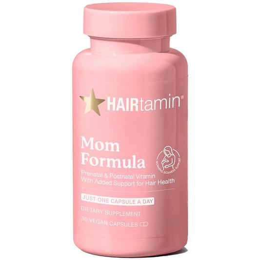 Pink prenatal vitamin supplement bottle labeled Mom Formula