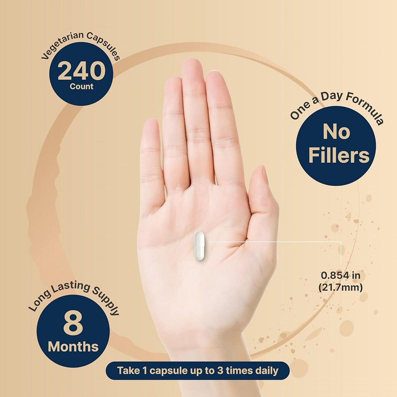 Hand holding a NatureBell magnesium glycinate capsule, vegetarian supplement