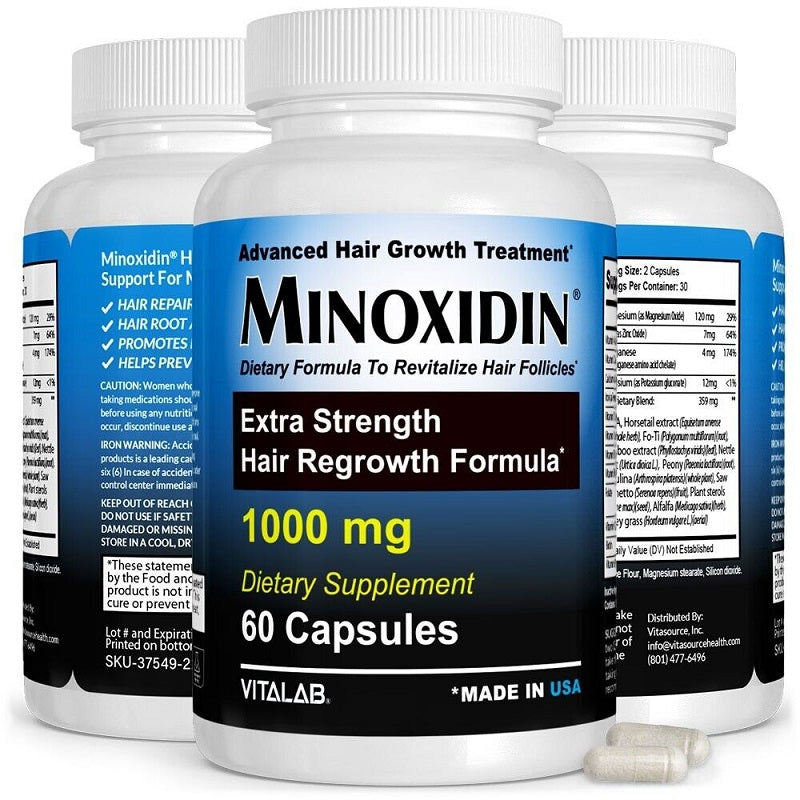 Hair regrowth supplement bottles with Extra Strength label and loose capsules