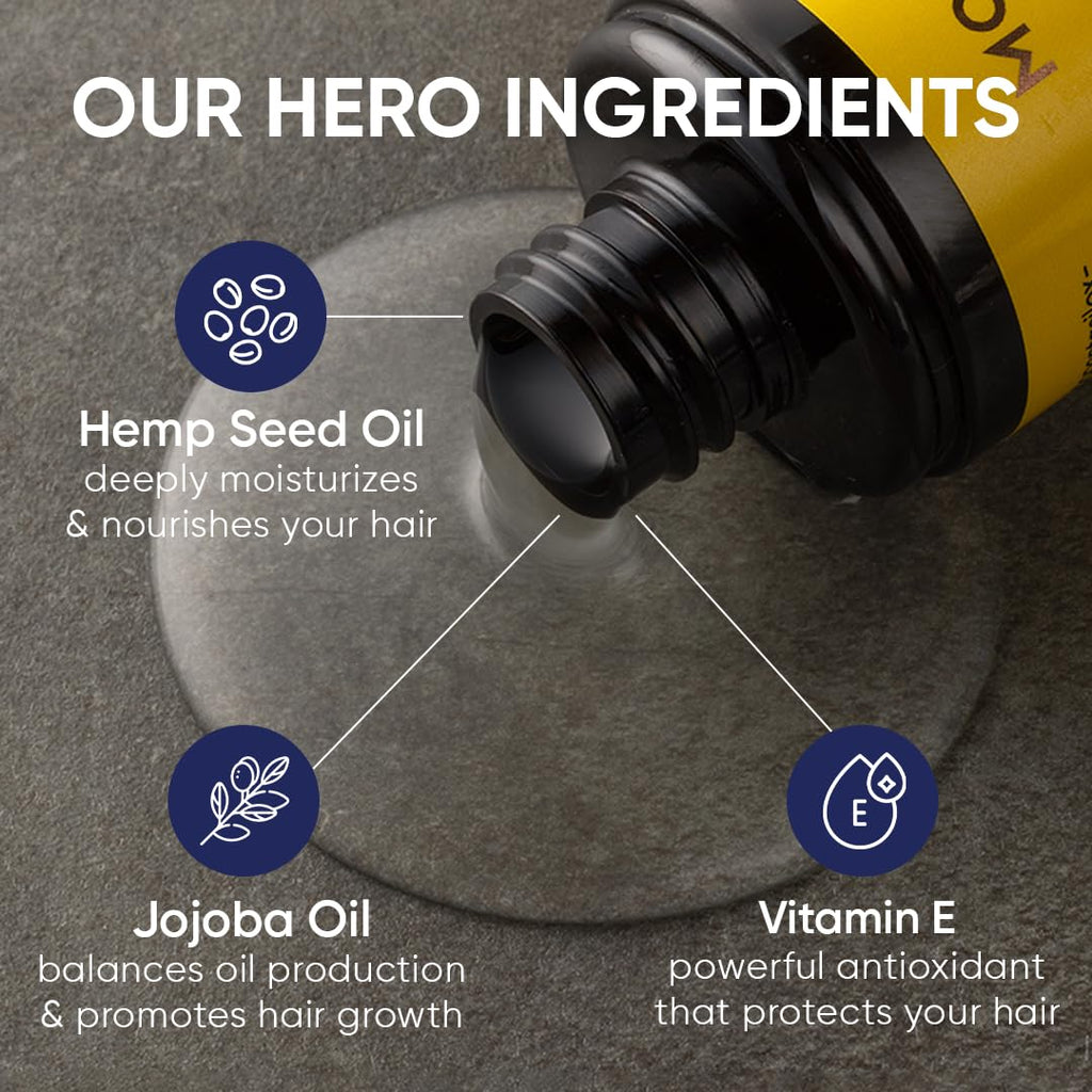 Ultimate hair oil bottle top with yellow label and black cap