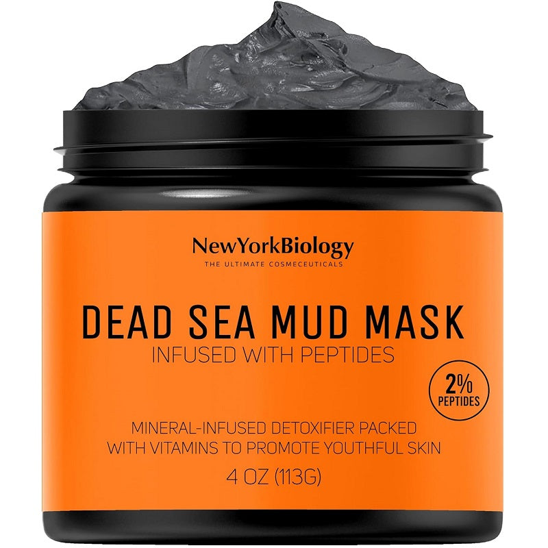 Skincare mud mask jar with orange label and black lid; 2% peptides badge