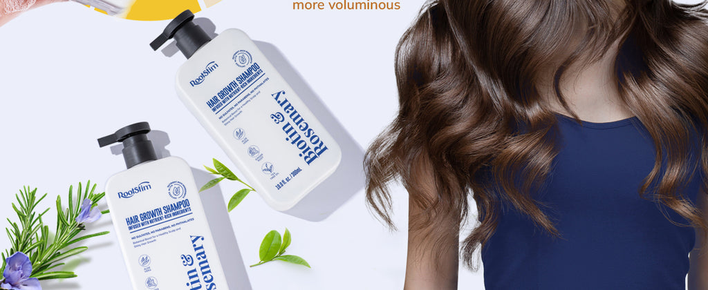 Hair growth shampoo bottles with black pumps and blue labels, shown at angle