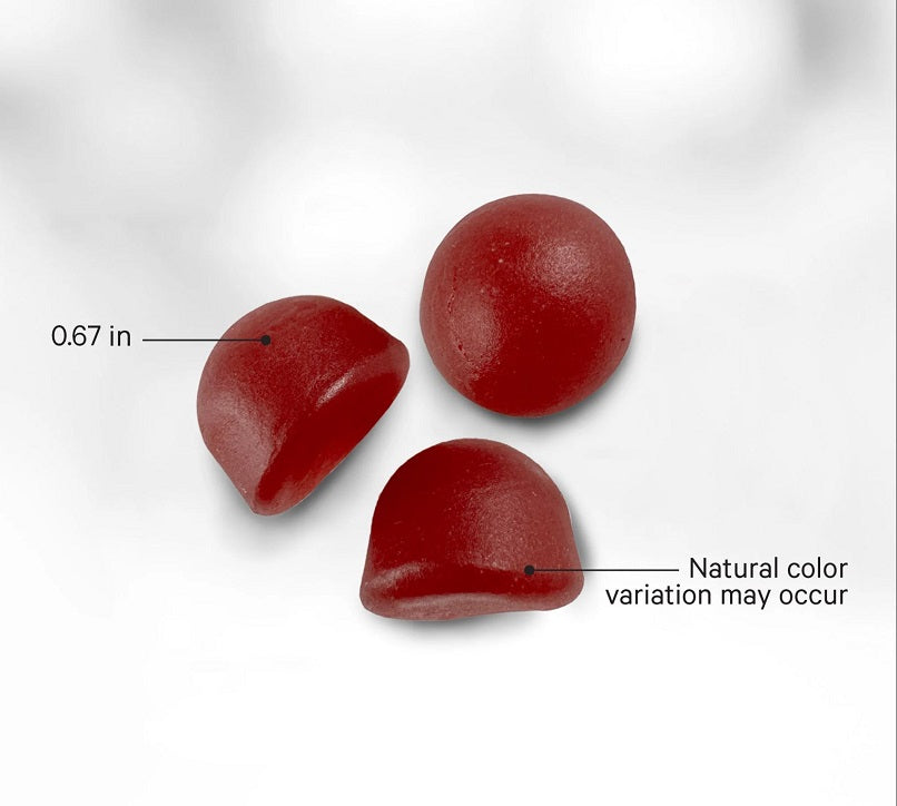 Three sea moss gummies, natural color; 0.67 in size, strawberry pieces