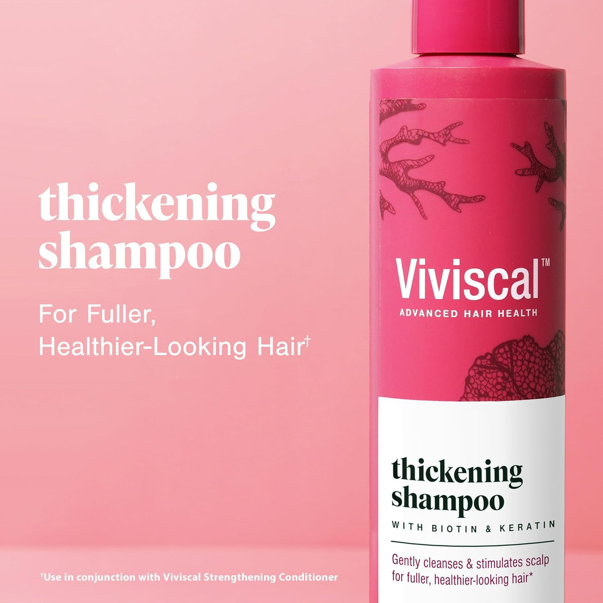 Viviscal thickening shampoo bottle with pink cap and thickening label