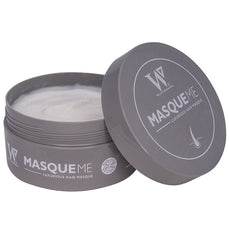 Hair mask jar with gray lid open, showing pale cream inside