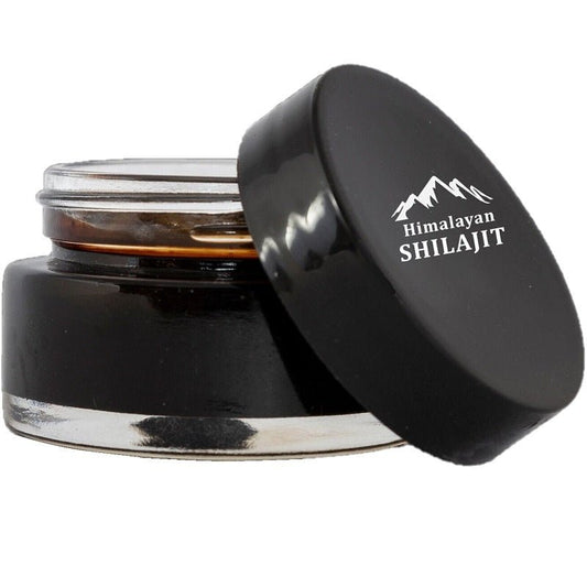 Glass jar of dark soft resin shilajit with black lid and label