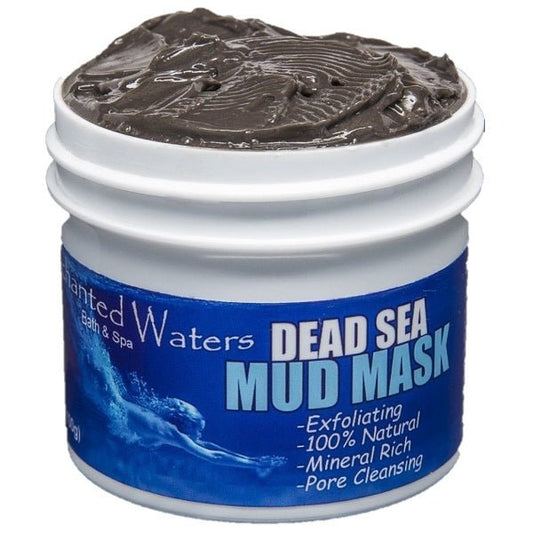 Dead Sea mud mask jar with dark brown/black clay on the lid