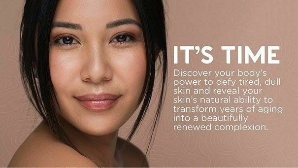 Woman with radiant, even-toned skin in serum marketing portrait