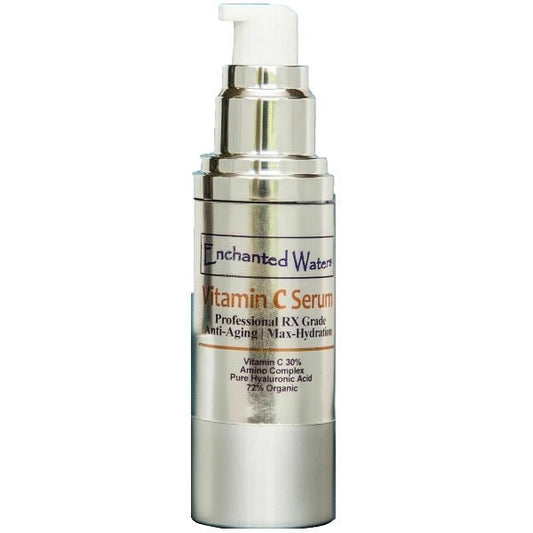 Vitamin C serum bottle with pump, gold cap, and metallic silver body