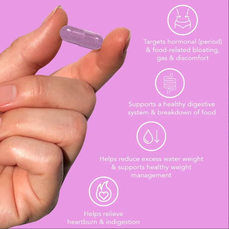 Hand holding a purple supplement capsule with digestive health benefit icons