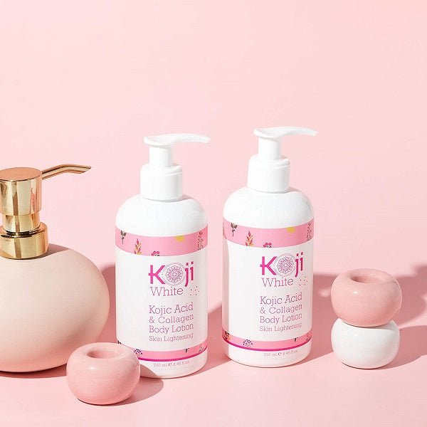 Body lotion bottles with white pumps and pink label, with pink cap-like accents