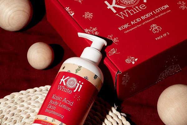 Koji White kojic acid body lotion bottle with pump beside product box