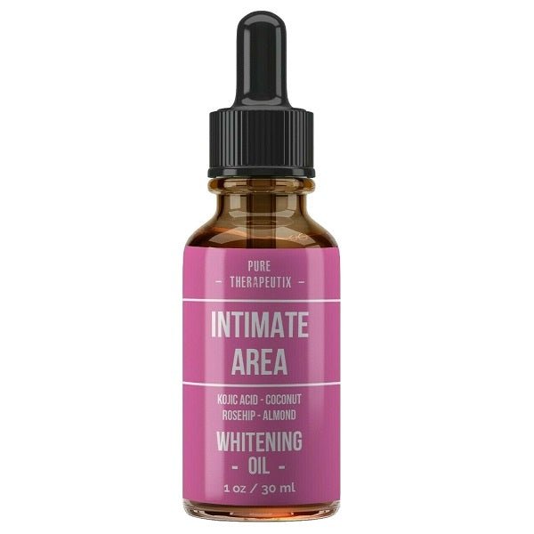 Intimate area whitening oil bottle with black dropper, amber liquid, pink label