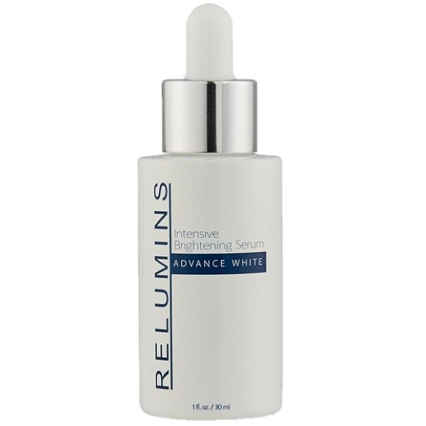 Intensive brightening serum bottle with dropper, white label and silver cap